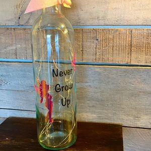 ‘ never grow up’ wine bottle lantern